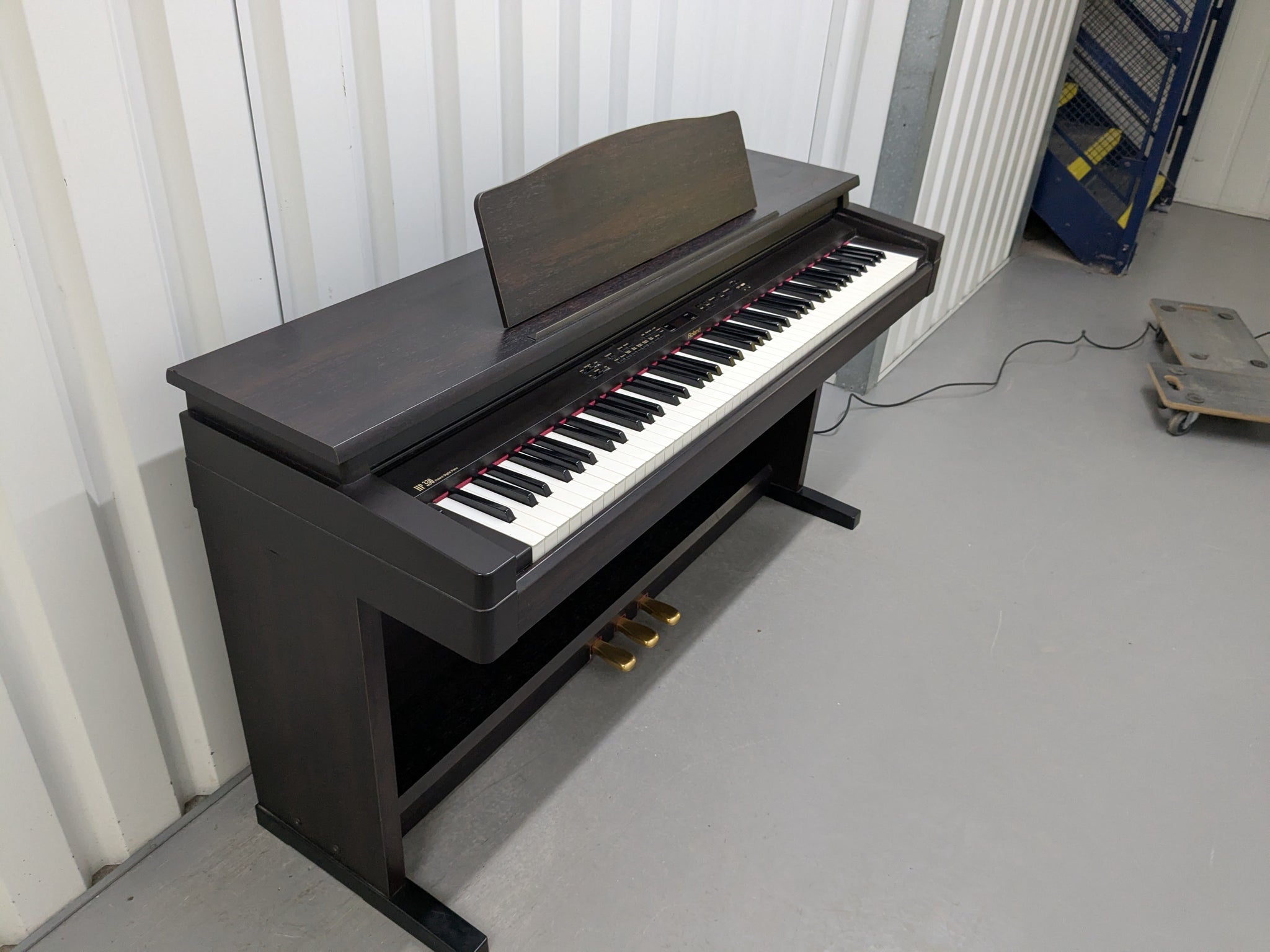 Roland HP330 digital piano in rosewood stock #25046 – Sulinda Music