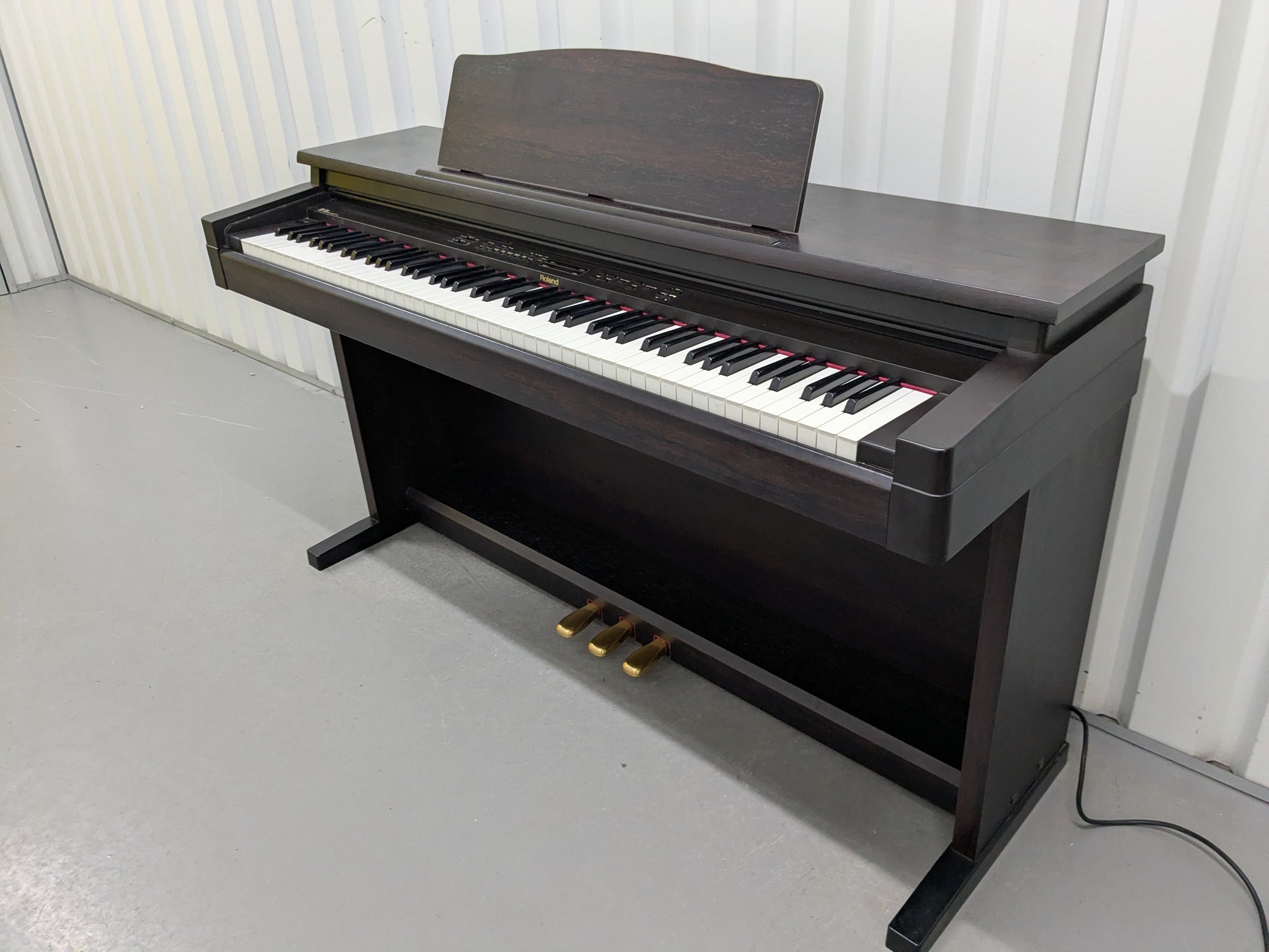 Roland HP330 digital piano in rosewood stock #25046 – Sulinda Music