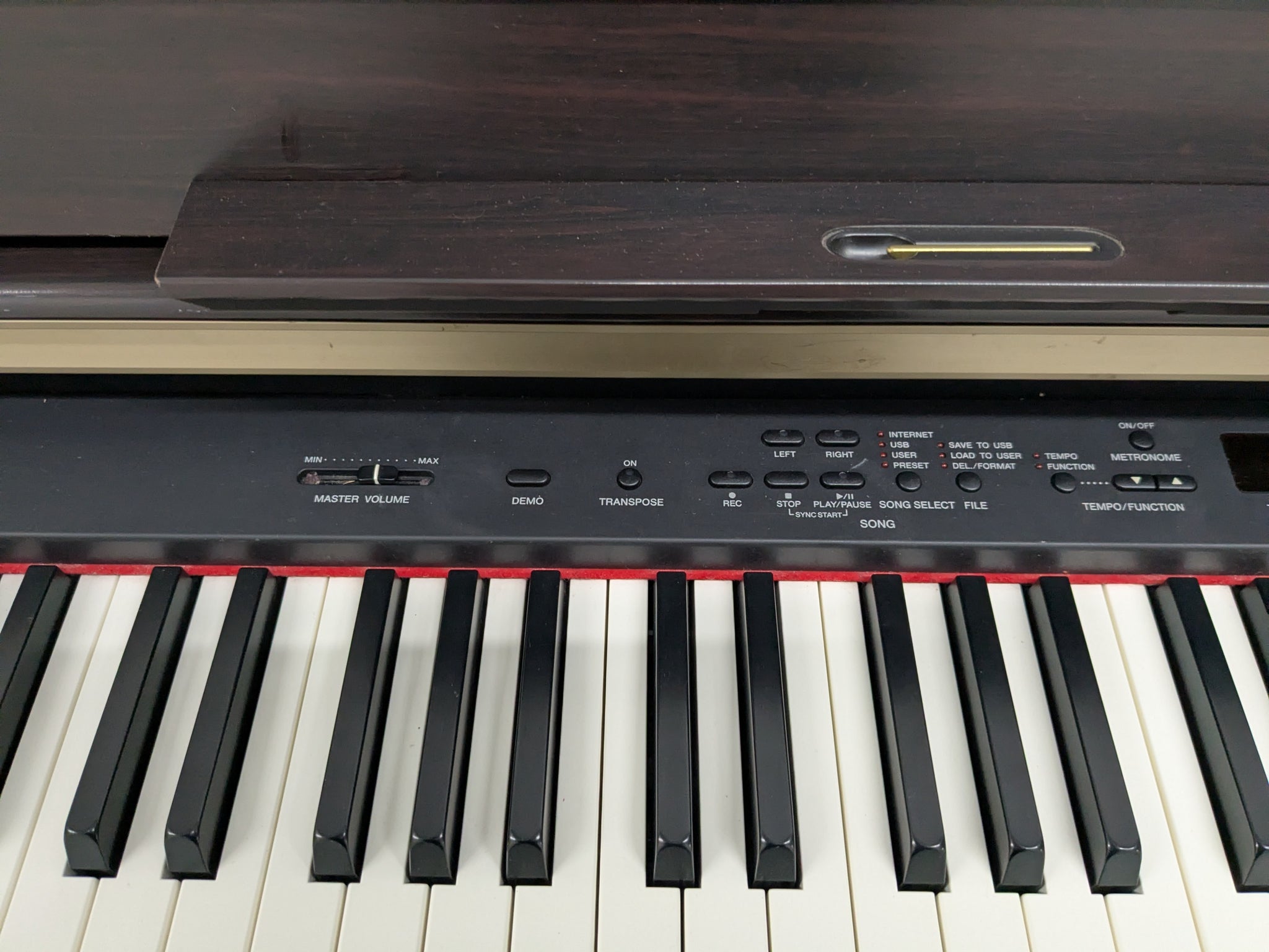 Yamaha Clavinova CLP-340 Digital Piano and stool in dark