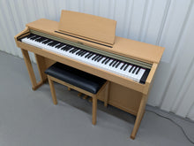 Load image into Gallery viewer, Roland HP201 digital piano and stool in light oak finish stock number 25085
