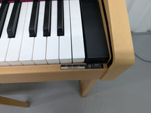 Load image into Gallery viewer, Roland HP201 digital piano and stool in light oak finish stock number 25085
