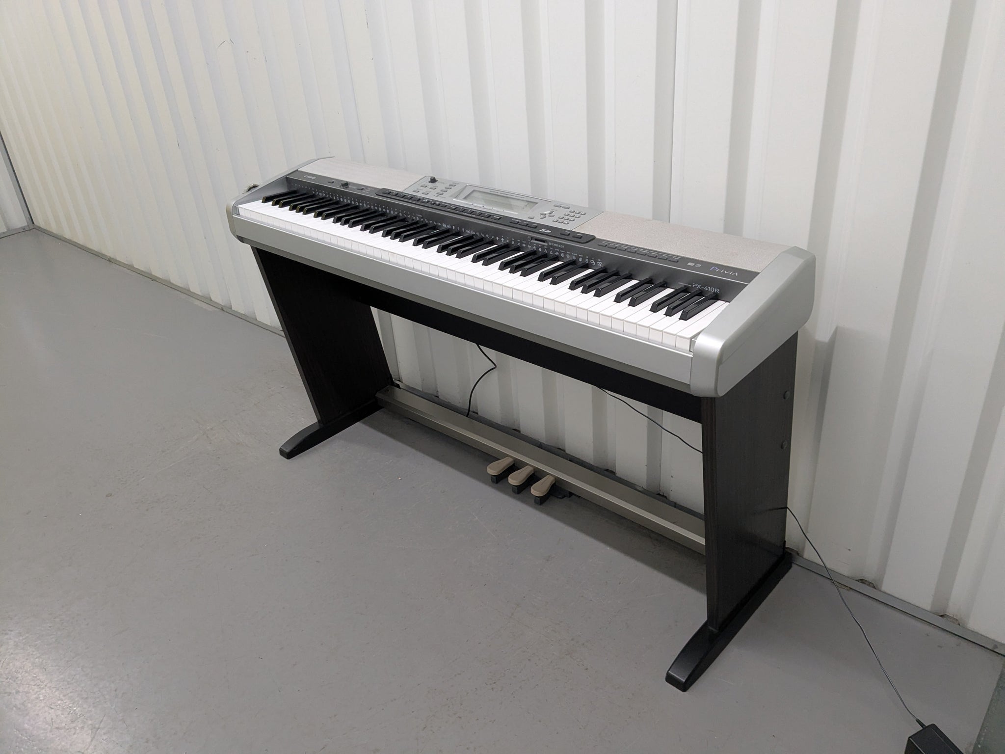 casio privia stand and pedals Casio Privia PX-410R digital piano with stand and sustain pedal #25050 – Sulinda Music