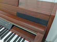 Load image into Gallery viewer, YAMAHA CLAVINOVA CLP-270 DIGITAL PIANO AND STOOL IN MAHOGANY FINISH stock #25096
