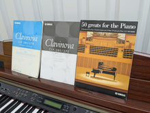 Load image into Gallery viewer, YAMAHA CLAVINOVA CLP-270 DIGITAL PIANO AND STOOL IN MAHOGANY FINISH stock #25096
