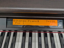 Load image into Gallery viewer, Casio Celviano AP-80R Digital Piano / arranger in rosewood stock # 25124

