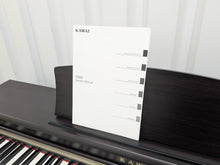Load image into Gallery viewer, Kawai digital piano CN24 In Dark Rosewood Finish stock number 25144
