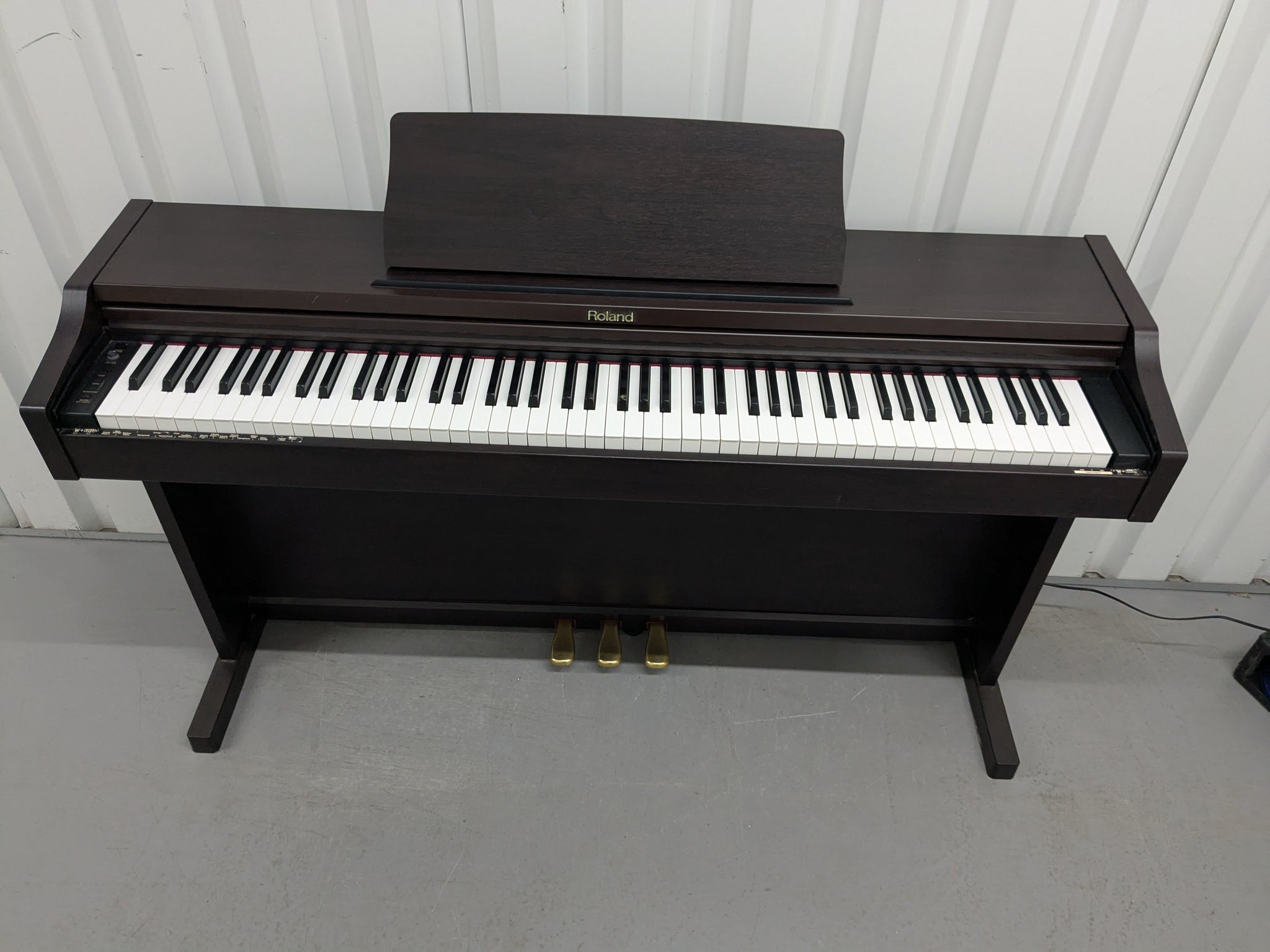 Roland RP101 Digital Piano in dark rosewood Stock # 2590 – Sulinda
