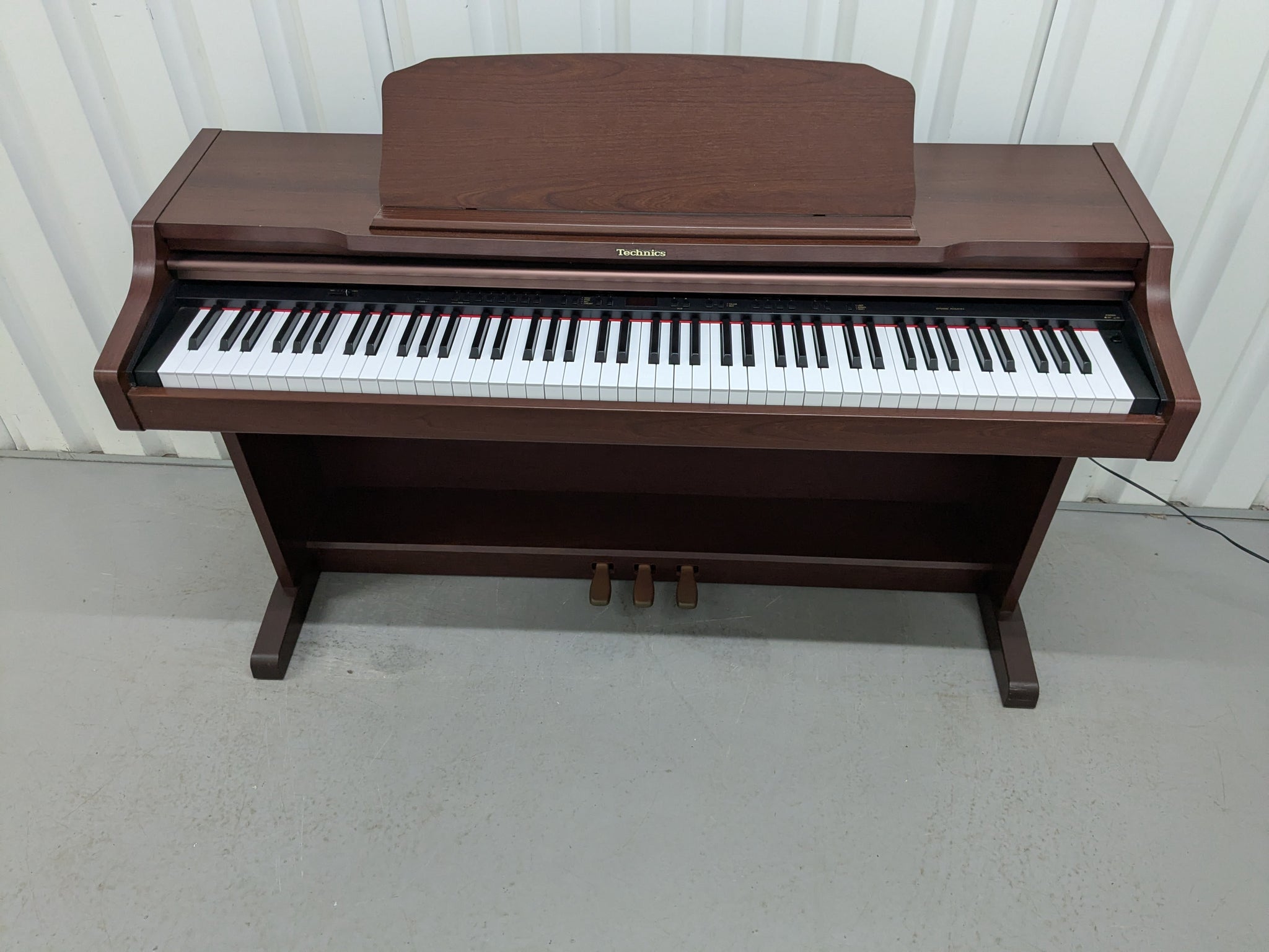 TECHNICS SX-PX552 DIGITAL PIANO IN MAHOGANY stock number 25200