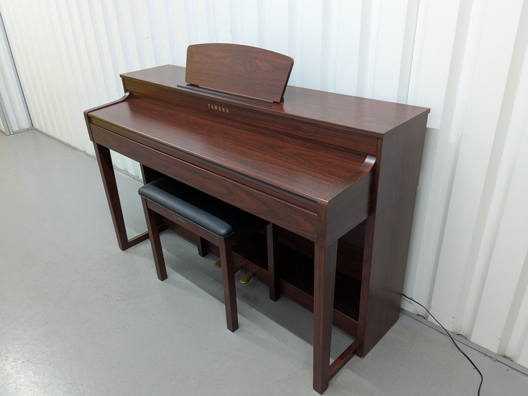 Yamaha Clavinova CLP-430 Digital Piano and stool in mahogany stock #25211