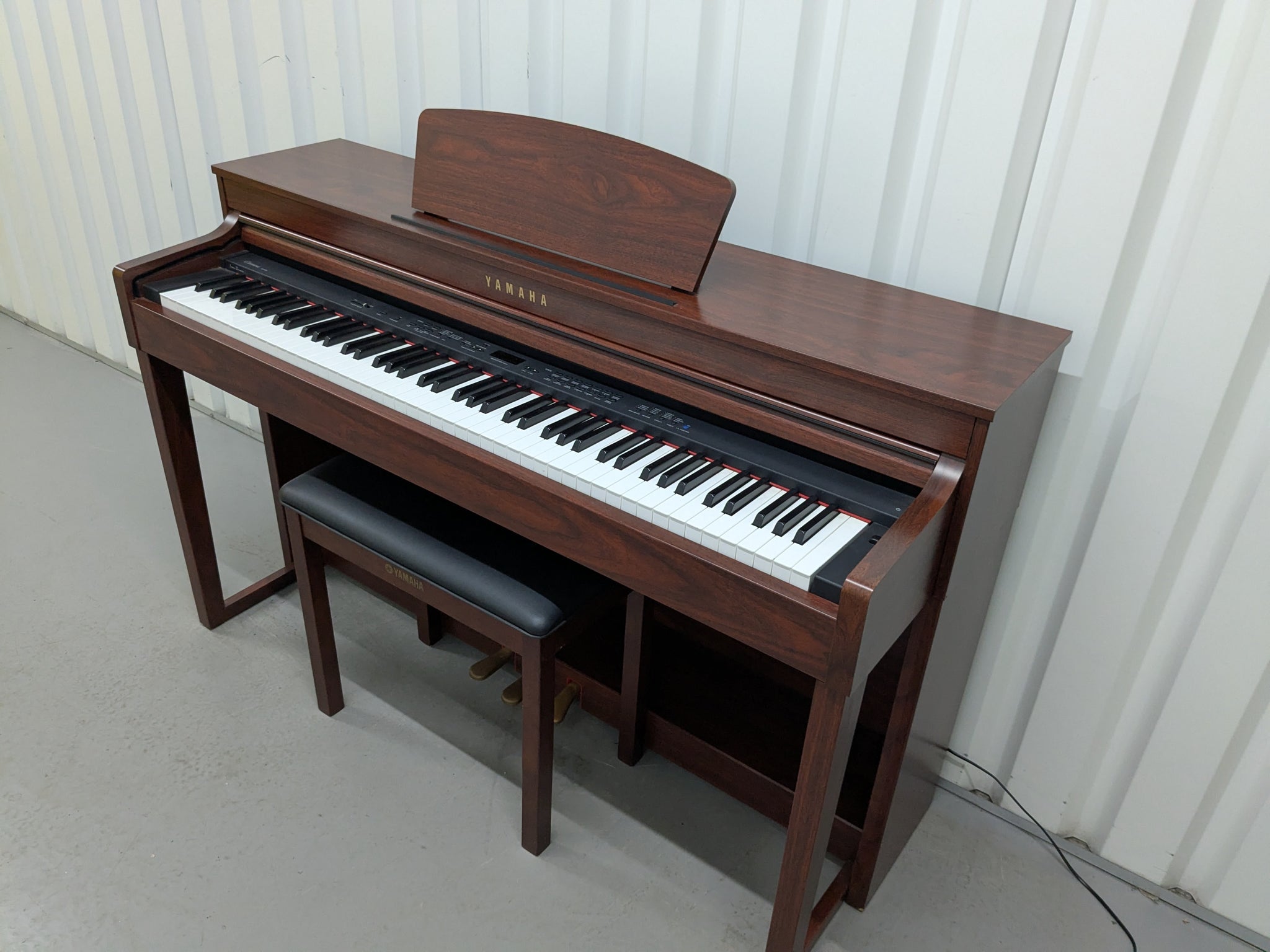 Yamaha Clavinova CLP-430 Digital Piano and stool in mahogany stock