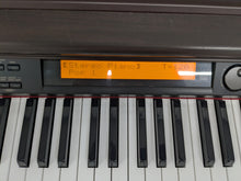 Load image into Gallery viewer, Casio Celviano AP-80R Digital Piano / arranger in rosewood stock # 25207
