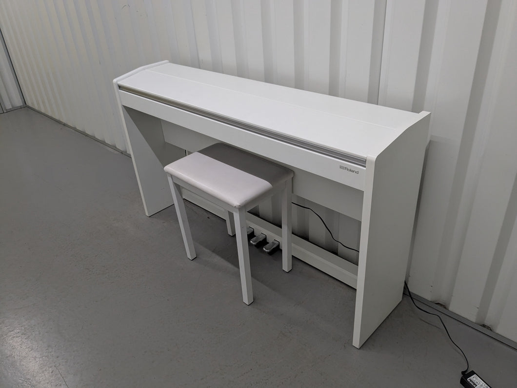 Roland F140R Digital Piano in satin white slim line space saver stock # 25230