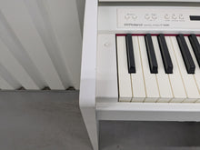 Load image into Gallery viewer, Roland F140R Digital Piano in satin white slim line space saver stock # 25230
