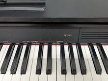Load image into Gallery viewer, Casio Celviano AP-250 digital piano and stool in satin black finish stock number 25249
