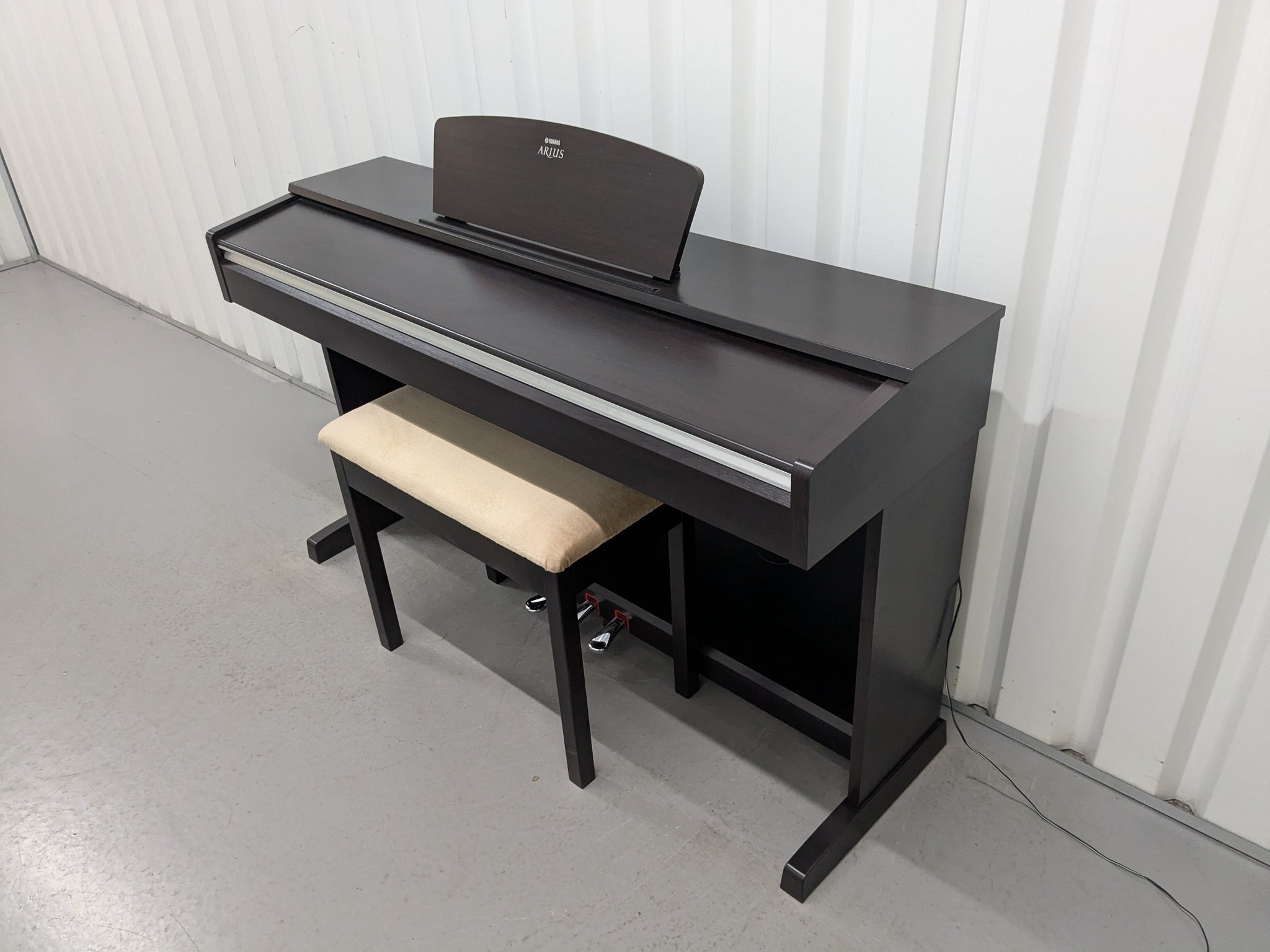 Yamaha Arius YDP-141 digital piano and stool in rosewood finish