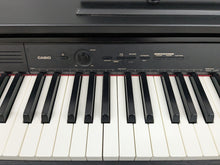 Load image into Gallery viewer, Casio Celviano AP-245 digital piano in satin black finish stock number 25269
