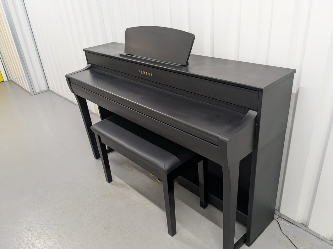 Yamaha Clavinova CLP-735 digital piano and stool in black finish stock nr 25267