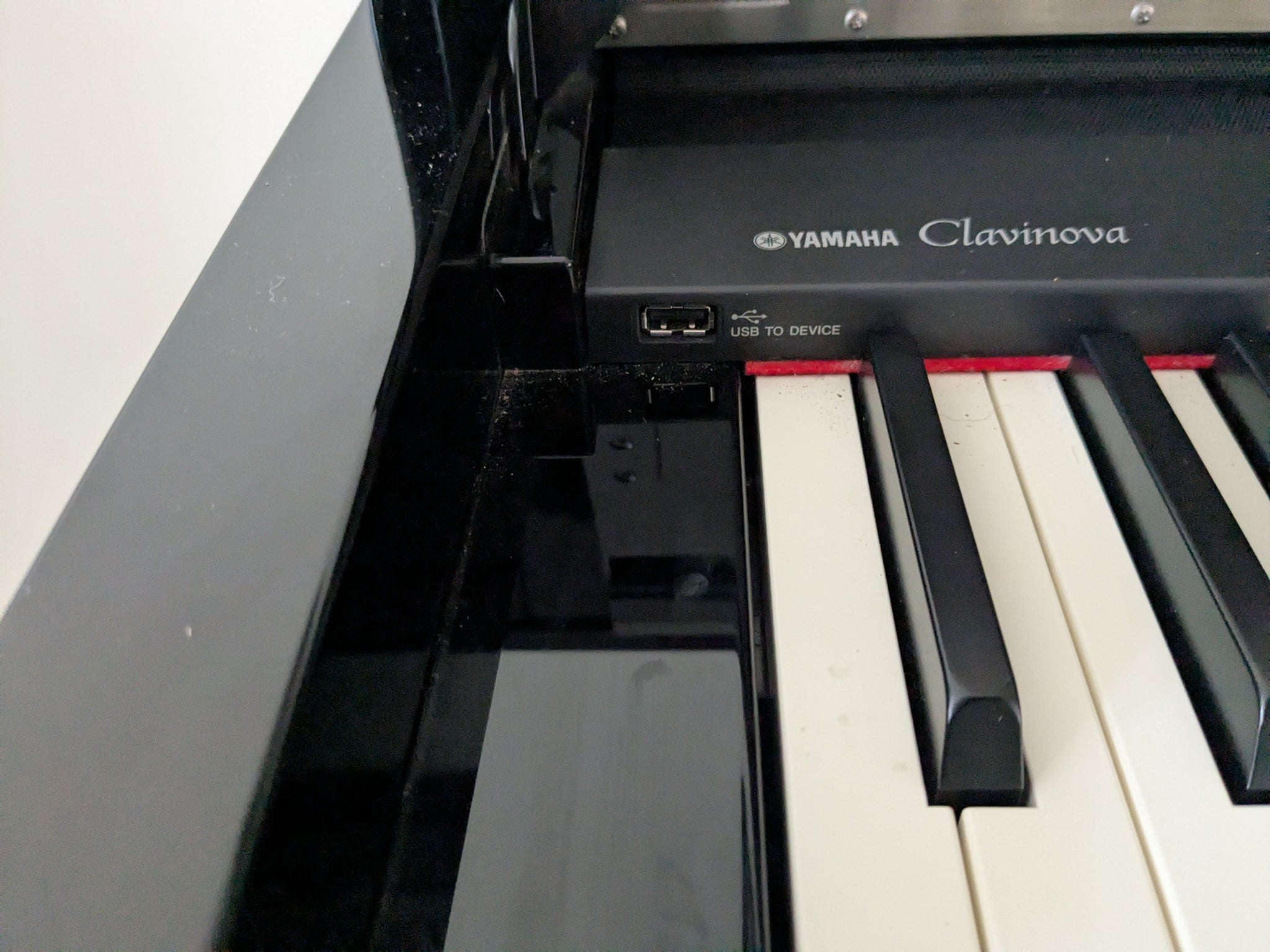 Yamaha Clavinova CLP-S306 digital piano and stool in polished