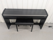 Load image into Gallery viewer, Roland F140R Digital Piano in satin black slim line space saver stock # 25303
