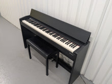Load image into Gallery viewer, Roland F140R Digital Piano in satin black slim line space saver stock # 25303

