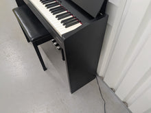 Load image into Gallery viewer, Roland F140R Digital Piano in satin black slim line space saver stock # 25303
