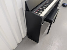 Load image into Gallery viewer, Roland F140R Digital Piano in satin black slim line space saver stock # 25303
