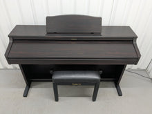 Load image into Gallery viewer, Roland HP-2e digital piano and stool in dark rosewood finish stock number 25317
