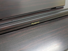 Load image into Gallery viewer, Roland HP-2e digital piano and stool in dark rosewood finish stock number 25317
