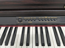 Load image into Gallery viewer, Roland HP-2e digital piano and stool in dark rosewood finish stock number 25317
