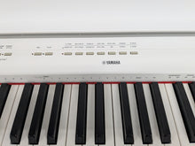 Load image into Gallery viewer, Yamaha P-115 digital portable piano with collapsible stand and pedal white stock #25325
