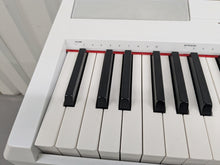 Load image into Gallery viewer, Yamaha P-115 digital portable piano with collapsible stand and pedal white stock #25325
