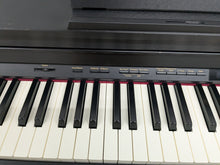 Load image into Gallery viewer, Roland HP503 digital piano and stool in satin black finish stock number 25308
