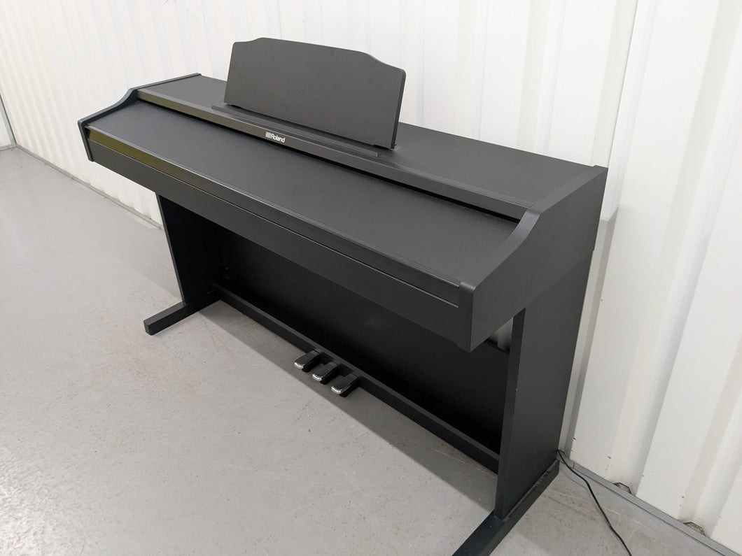 Roland RP102 digital piano in satin black finish stock number 25333