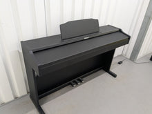 Load image into Gallery viewer, Roland RP102 digital piano in satin black finish stock number 25333
