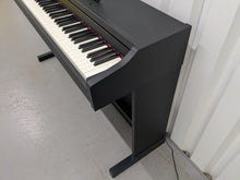 Load image into Gallery viewer, Roland RP102 digital piano in satin black finish stock number 25333
