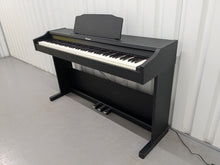 Load image into Gallery viewer, Roland RP102 digital piano in satin black finish stock number 25333
