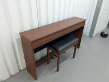 Load image into Gallery viewer, Roland DP990 digital slim line space saving piano in mahogany stock # 25331
