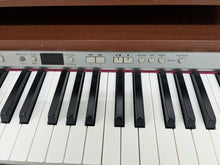 Load image into Gallery viewer, Roland DP990 digital slim line space saving piano in mahogany stock # 25331
