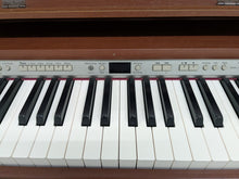 Load image into Gallery viewer, Roland DP990 digital slim line space saving piano in mahogany stock # 25331
