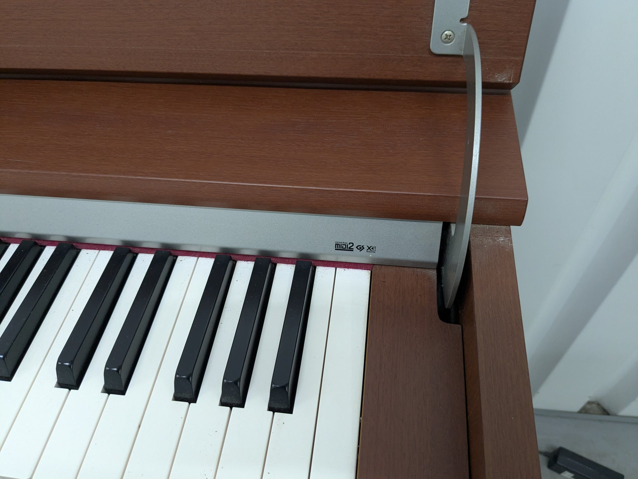 Roland DP990 digital slim line space saving piano in mahogany