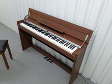 Load image into Gallery viewer, Roland DP990 digital slim line space saving piano in mahogany stock # 25331
