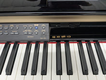 Load image into Gallery viewer, Yamaha Clavinova CLP-170PE Digital Piano glossy black polished ebony stock #25339
