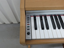 Load image into Gallery viewer, Yamaha Arius YDP-131 Digital Piano + stool in cherry wood finish stock nr 25341
