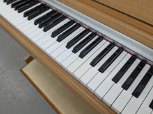 Load image into Gallery viewer, Yamaha Arius YDP-131 Digital Piano + stool in cherry wood finish stock nr 25341
