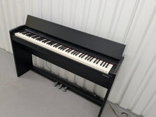 Load image into Gallery viewer, Roland F140R Digital Piano in satin black slim line space saver stock # 25351
