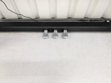 Load image into Gallery viewer, Roland F140R Digital Piano in satin black slim line space saver stock # 25351
