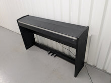 Load image into Gallery viewer, Roland F110 compact slim size Digital Piano in black  stock # 25364
