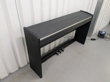 Load image into Gallery viewer, Roland F110 compact slim size Digital Piano in black  stock # 25364

