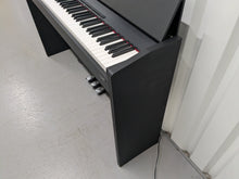 Load image into Gallery viewer, Roland F110 compact slim size Digital Piano in black  stock # 25364
