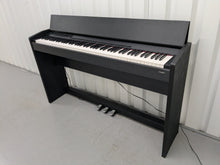 Load image into Gallery viewer, Roland F110 compact slim size Digital Piano in black  stock # 25364
